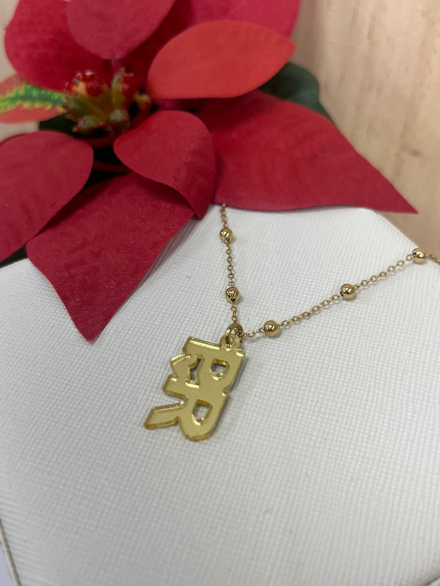 PR Gold Sign Necklace
